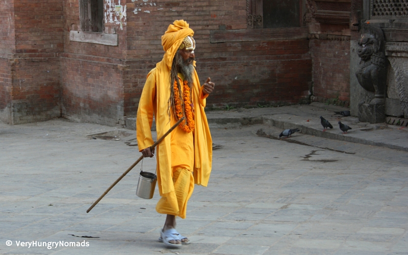 Man wondering the streets of Kathmandu - People we meet travelling