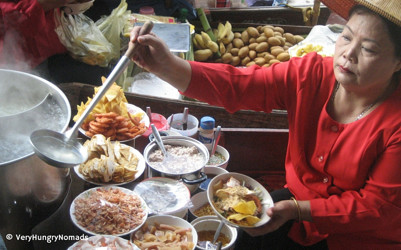 Thai food vendor at the floating market near Bangkok - People we meet travelling