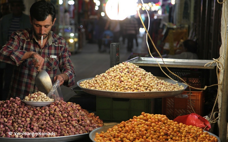 Market vendor selling pistachios in Isfahan, Iran - People we meet travelling