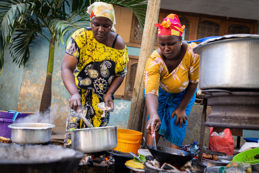 local African women cooking