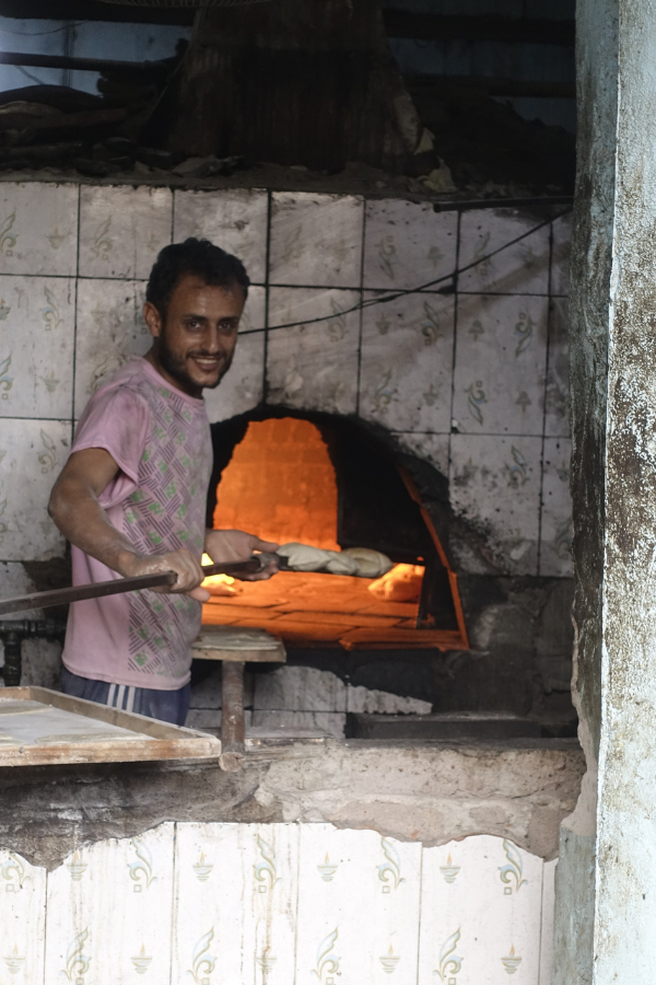 Baker cooking bread Yemen