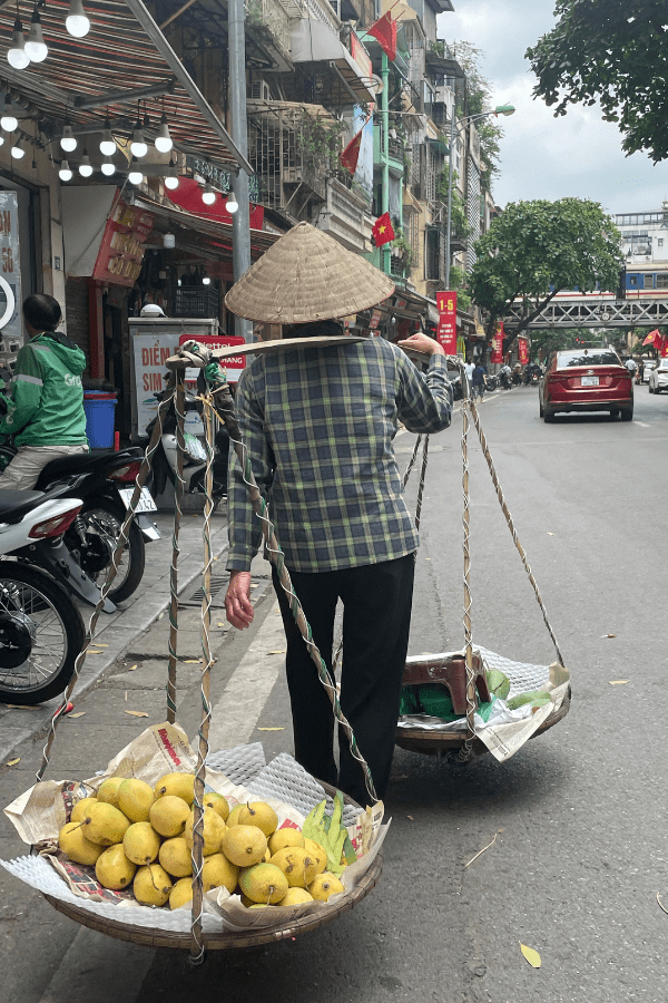 Best Food Tour in Hanoi - Fruit vendor