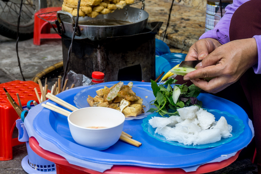 Food Tours In Hanoi - Street Food Vendor