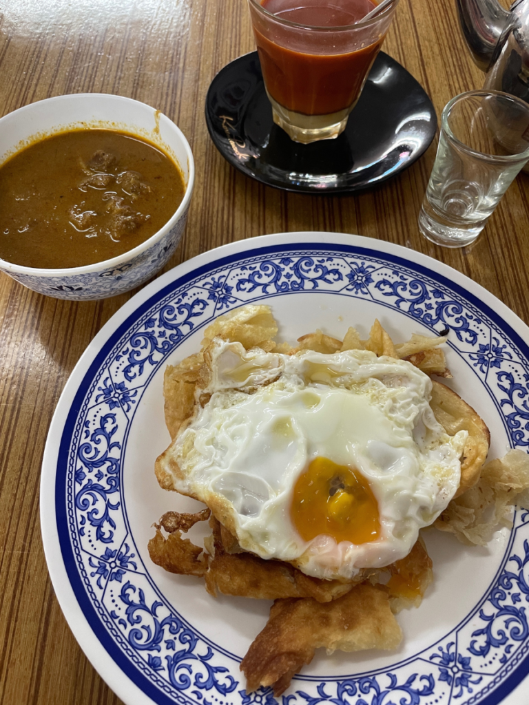 Roti, beef curry and fried egg Phuket