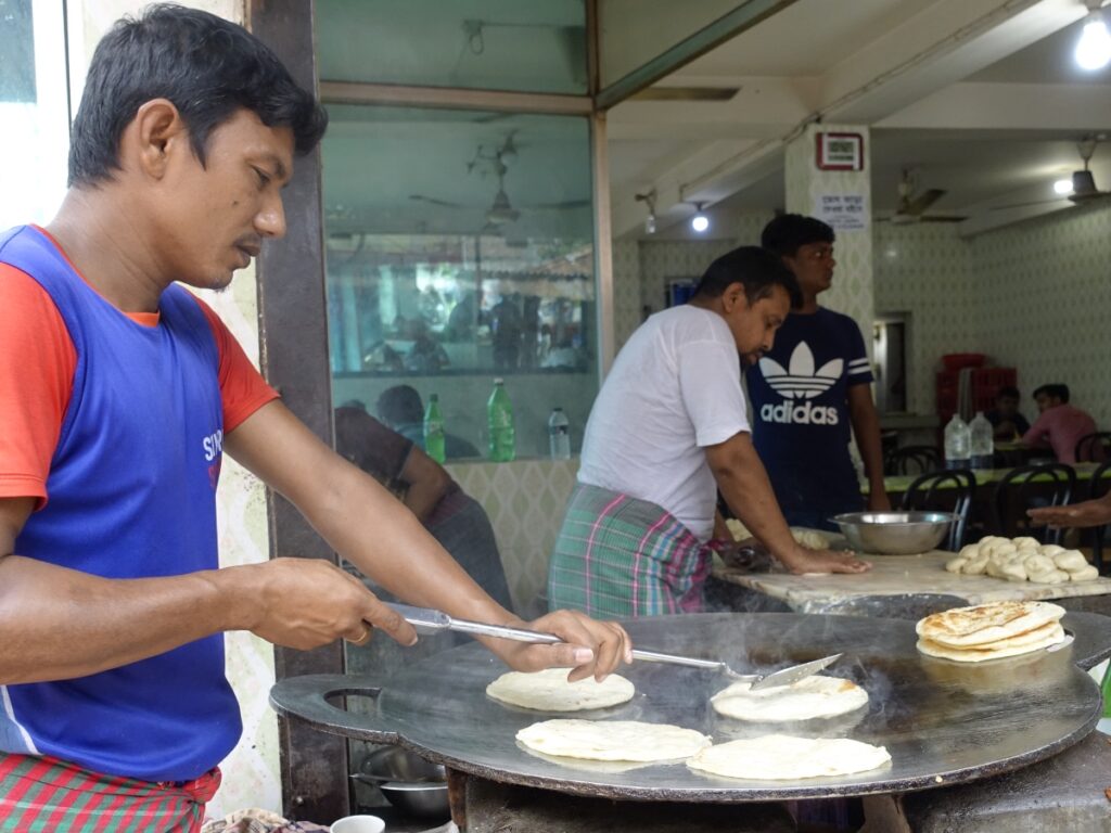 man making bread bangladesh