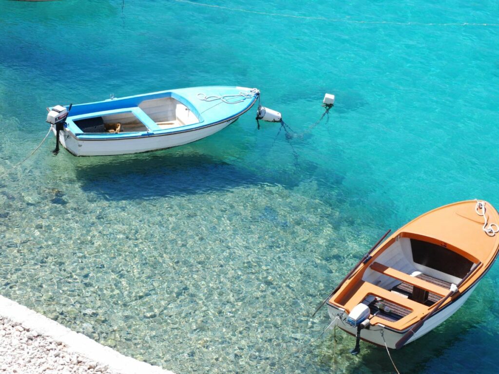popular places to go in Croatia boats on beach