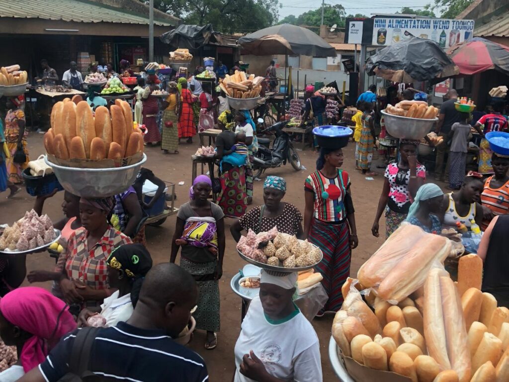 baguettes, market and local women in Burkina Faso